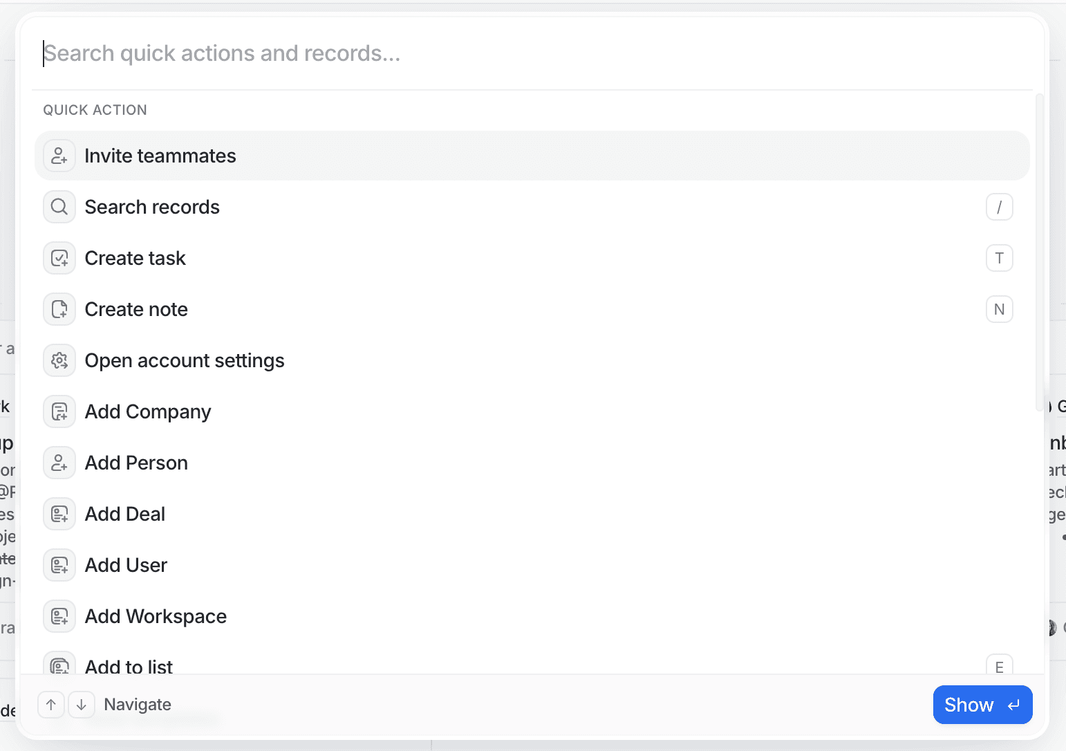 A search interface displaying options like "Invite teammates," "Search records," and "Create task" with shortcut keys beside each option.