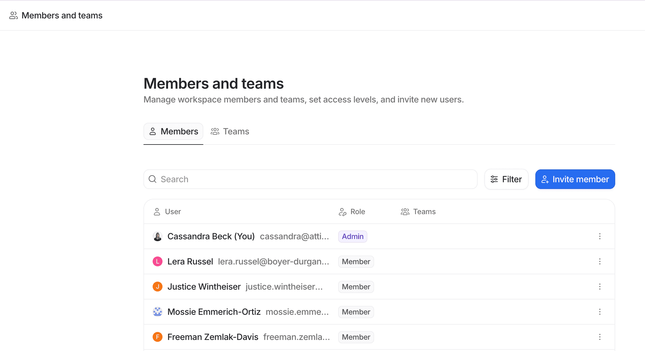 Screenshot of a team management interface displaying a list of users with their roles and email addresses alongside an "Invite member" button.